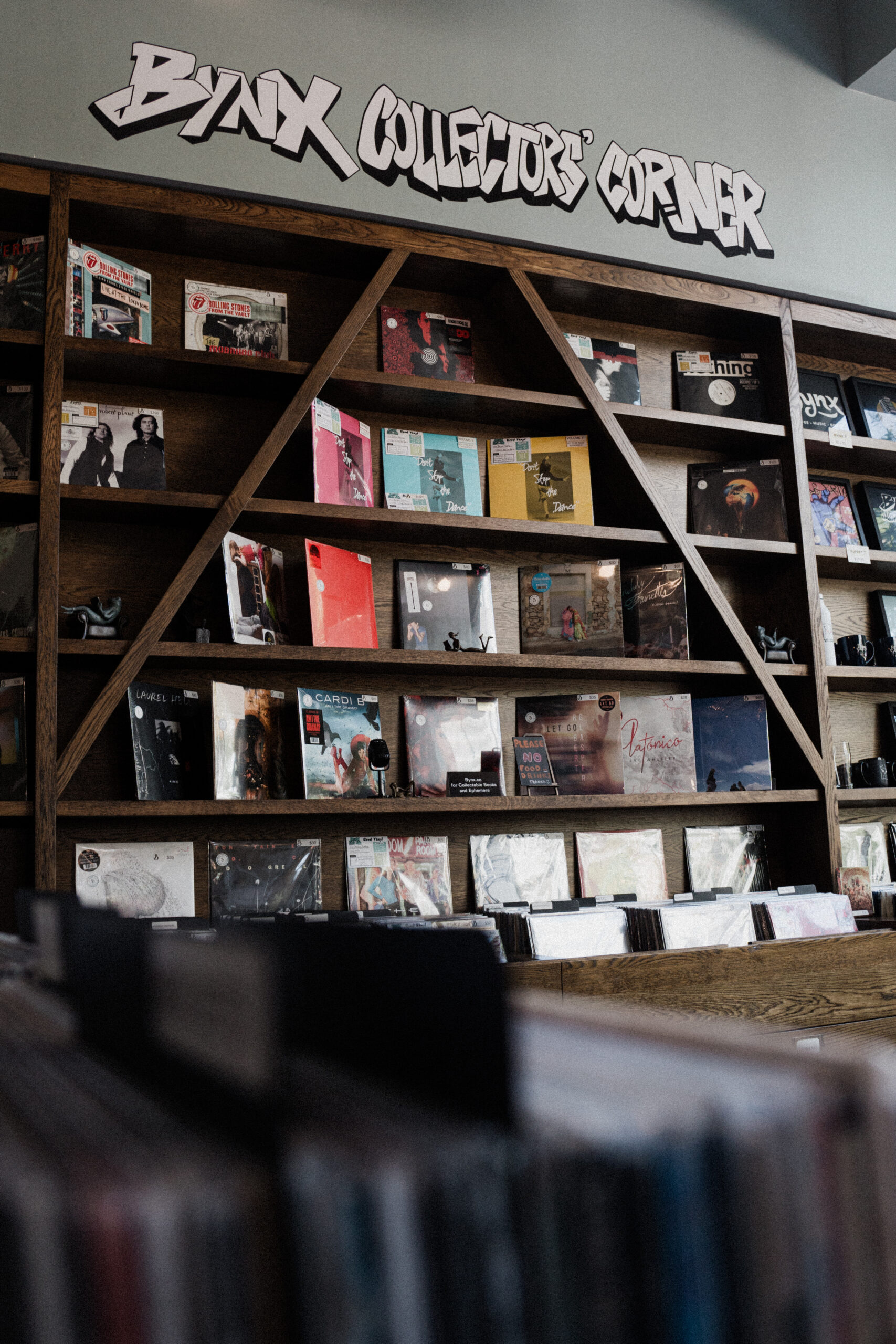 A DJ playing vinyl records at Bynx coffee shop in downtown Orlando