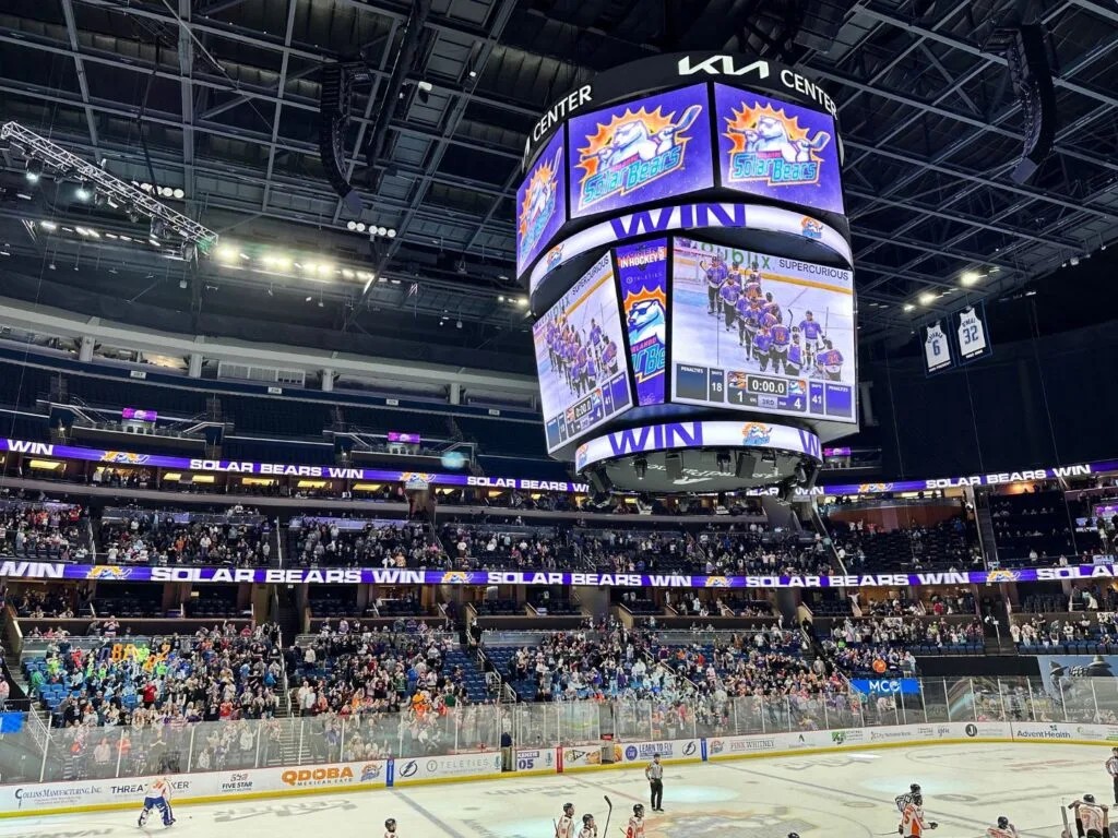 Solar Bears players on the ice in front of a home crowd at the Kia Center