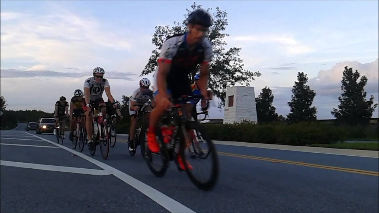Road cyclists starting an evening group ride in Windermere